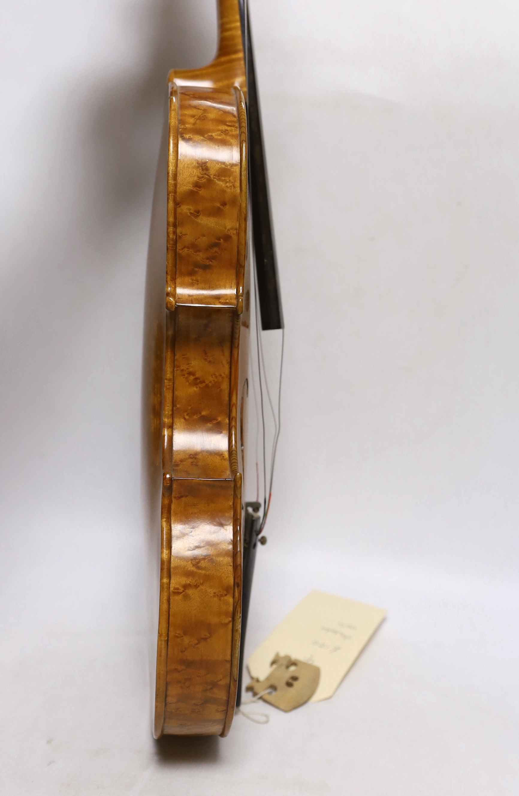 A bird's eye maple veneered student's violin, 58.5cm long